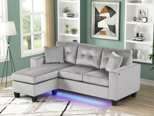 89342 Sorenza 74"W Gray Velvet Reversible Sectional Sofa Chaise with LED Light,USB Port & Pillows